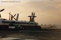 The Princess Anne (GH-2006) leaving Calais hoverport behind The Princess Margaret (GH-2007)